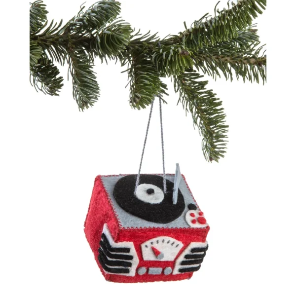 A red and black ornament hanging from a christmas tree.