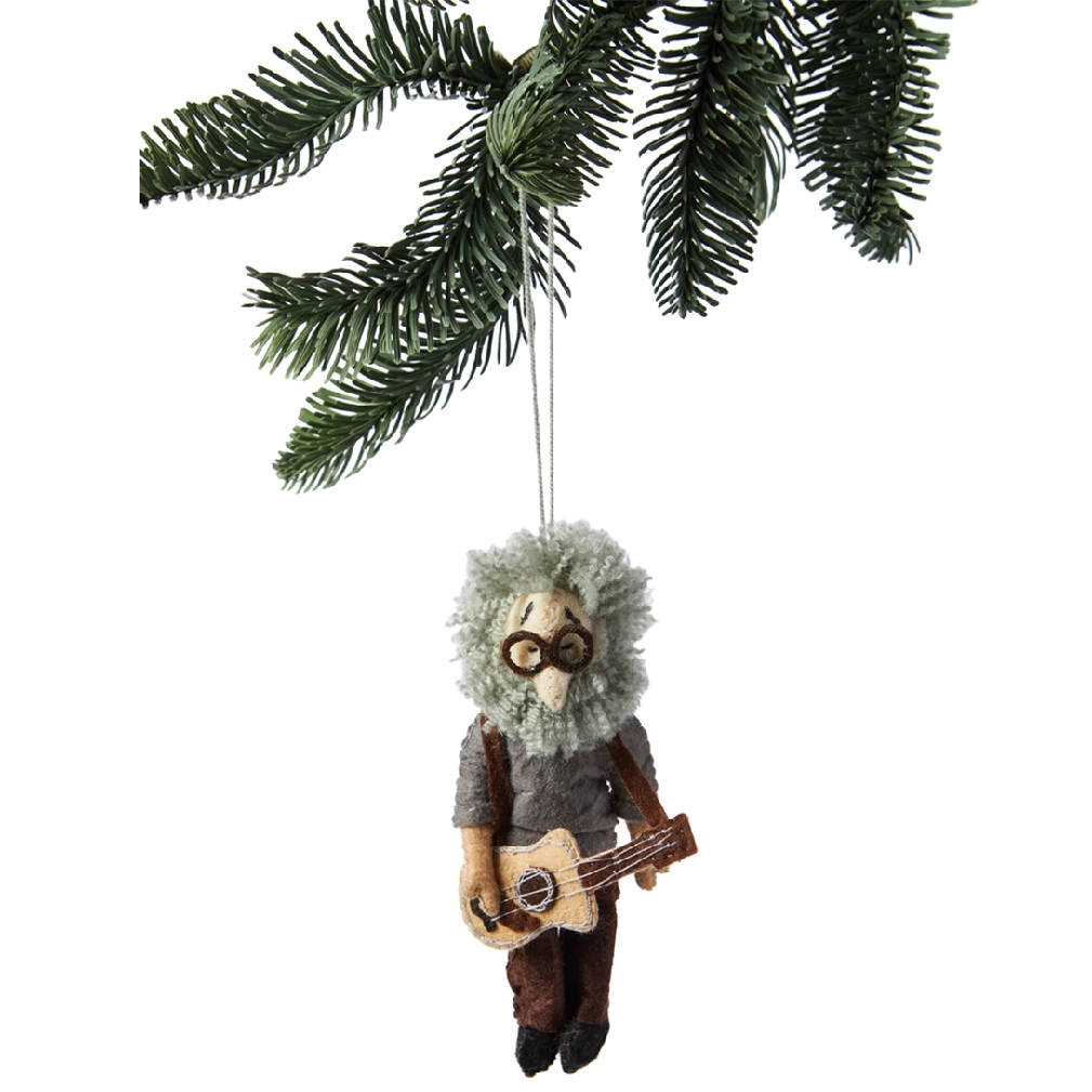 A man with glasses and a beard hanging from a christmas tree.