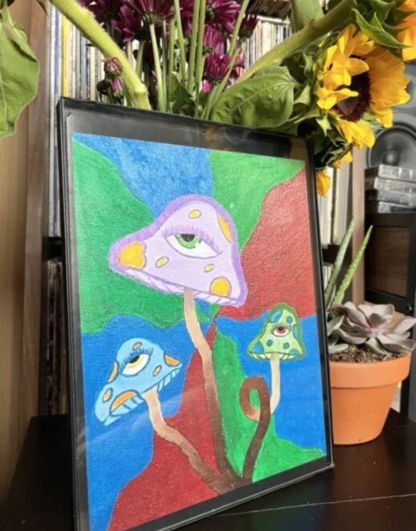 A painting of mushrooms with eyes and a plant in the background.