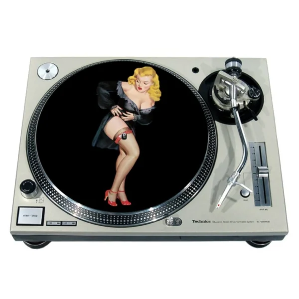 A record player with a picture of a woman on the lid.